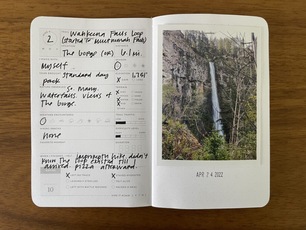 Spread of my Wahkeena Falls Loop hike at Multnomah Falls just outside Portland, Oregon. Details about the hike are written on the left page, a photo of Multnomah Falls is on the right page, with the date of the hike stamped beneath it.