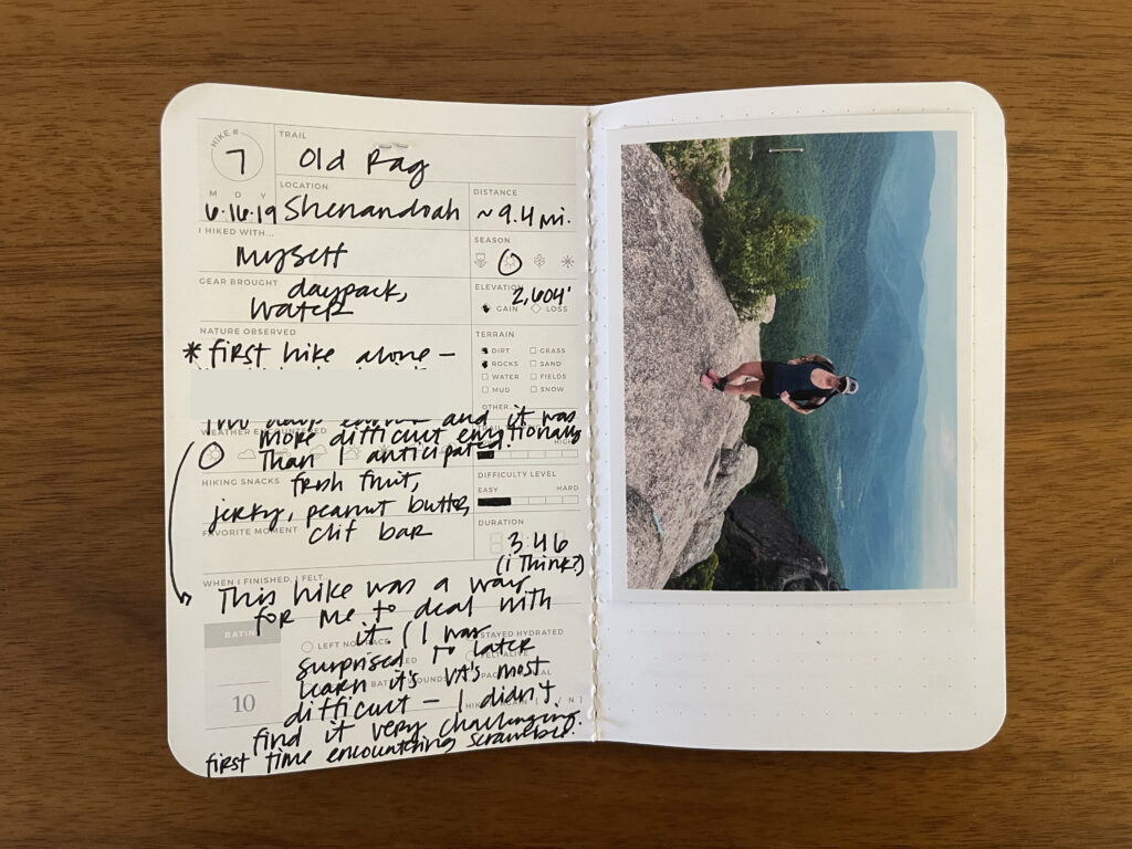 Spread of my Old Rag hike in Shenandoah National Park, Virginia. Details about the hike are written on the left page, a photo of me from the hike is on the right page, with the date of the hike stamped beneath it.