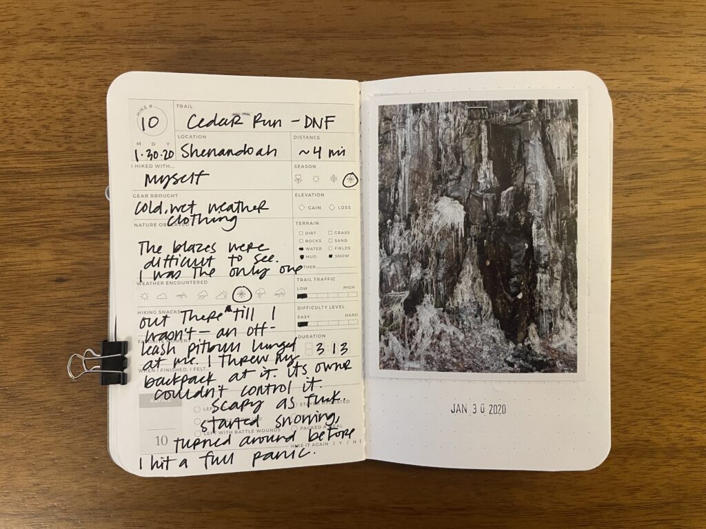 Spread of my Cedar Run hike in Shenandoah National Park, Virginia, which I did not finish. Details about the hike are written on the left page, a photo of ice-capped rocks is on the right page, with the date of the hike stamped beneath it.