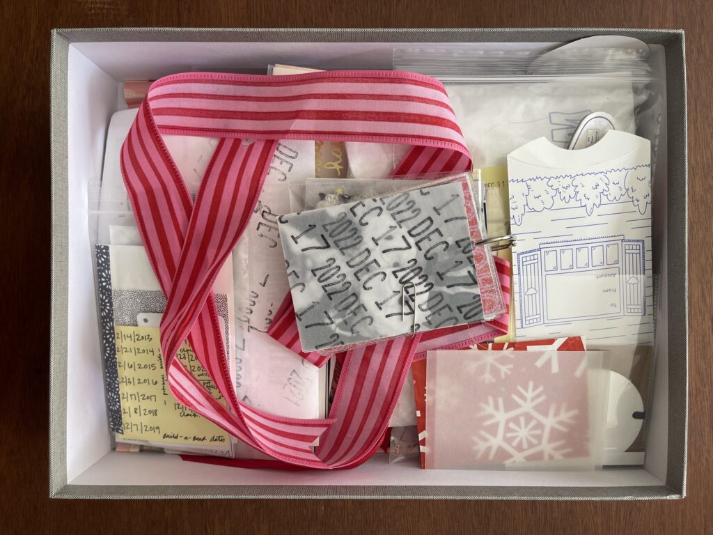 An open document box full of the different photos and supplies I used and considered using for this project. 