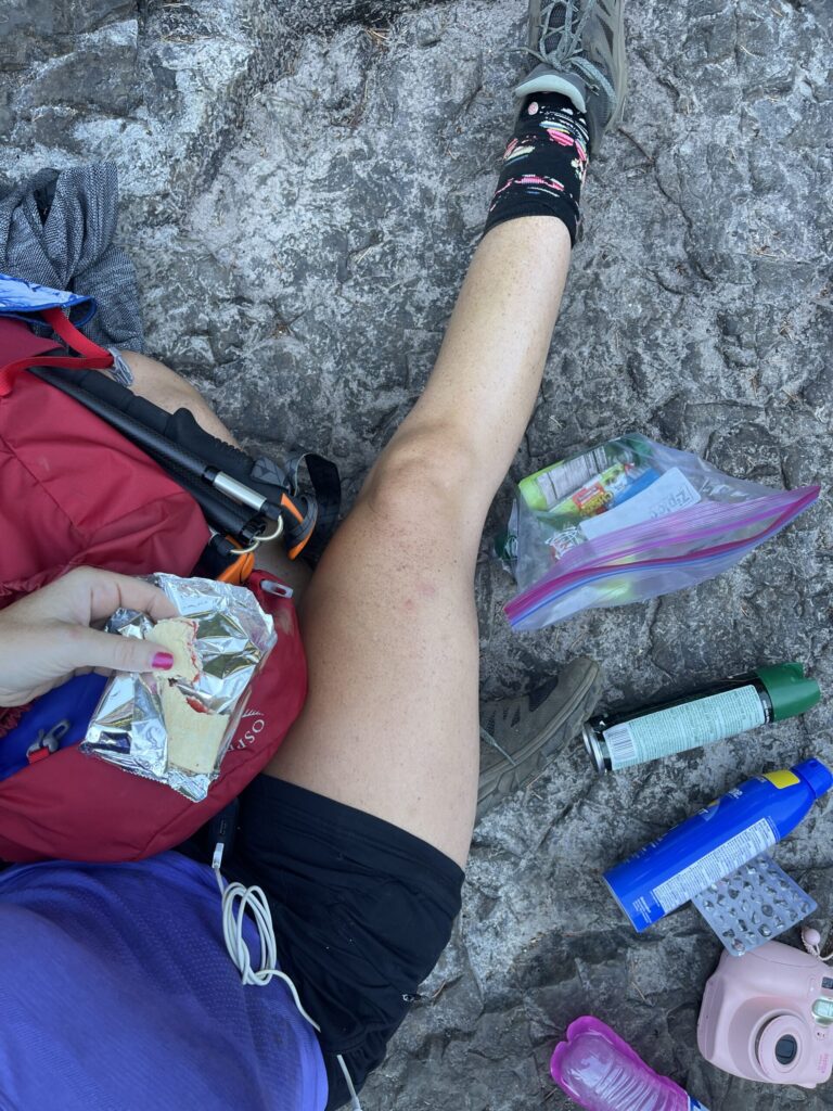 Me, sitting on the large, flat rocks at Twister Falls, eating Pop-Tarts and drinking electrolytes before heading back down the way I came.