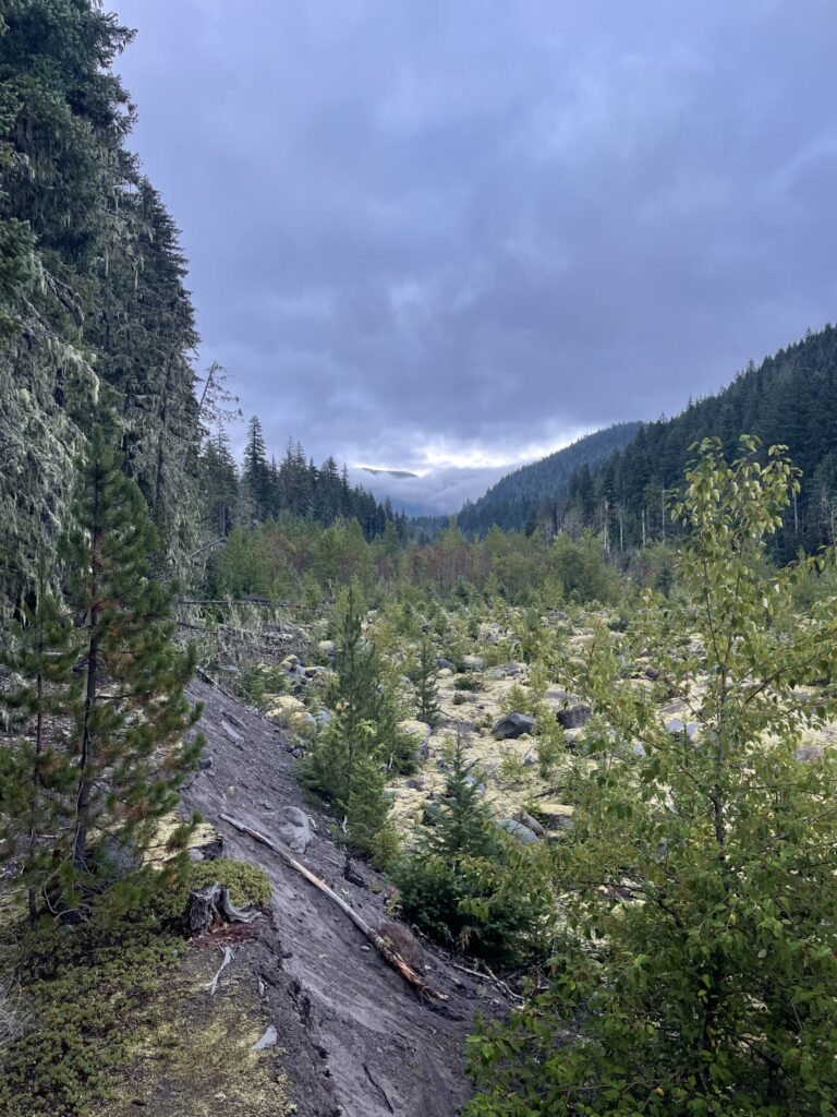 Overcast skies just beginning to barely break over Mount Hood (hidden by the clouds). 