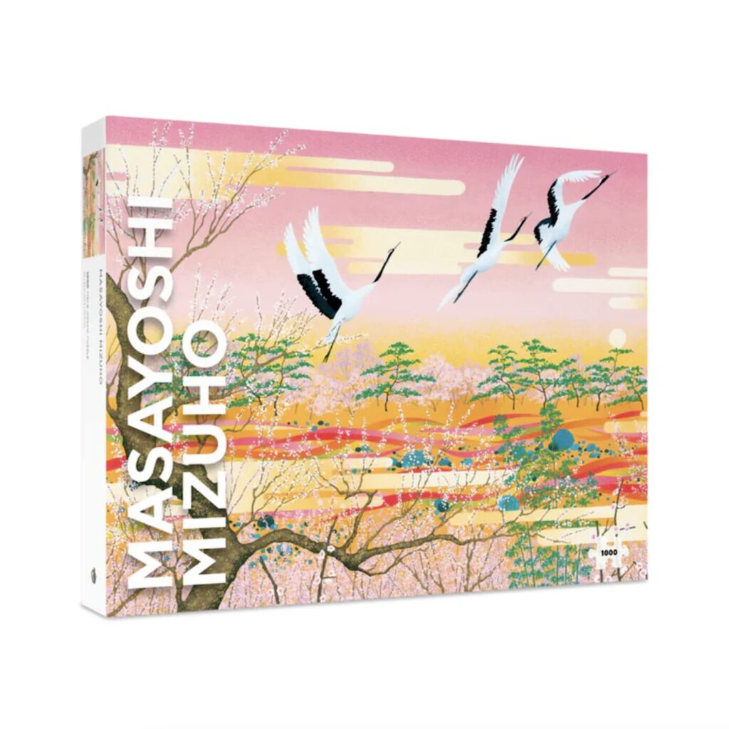 A 1,000-piece puzzle of an illustrated or painted Asian landscape featuring cherry blossom trees and cranes. 