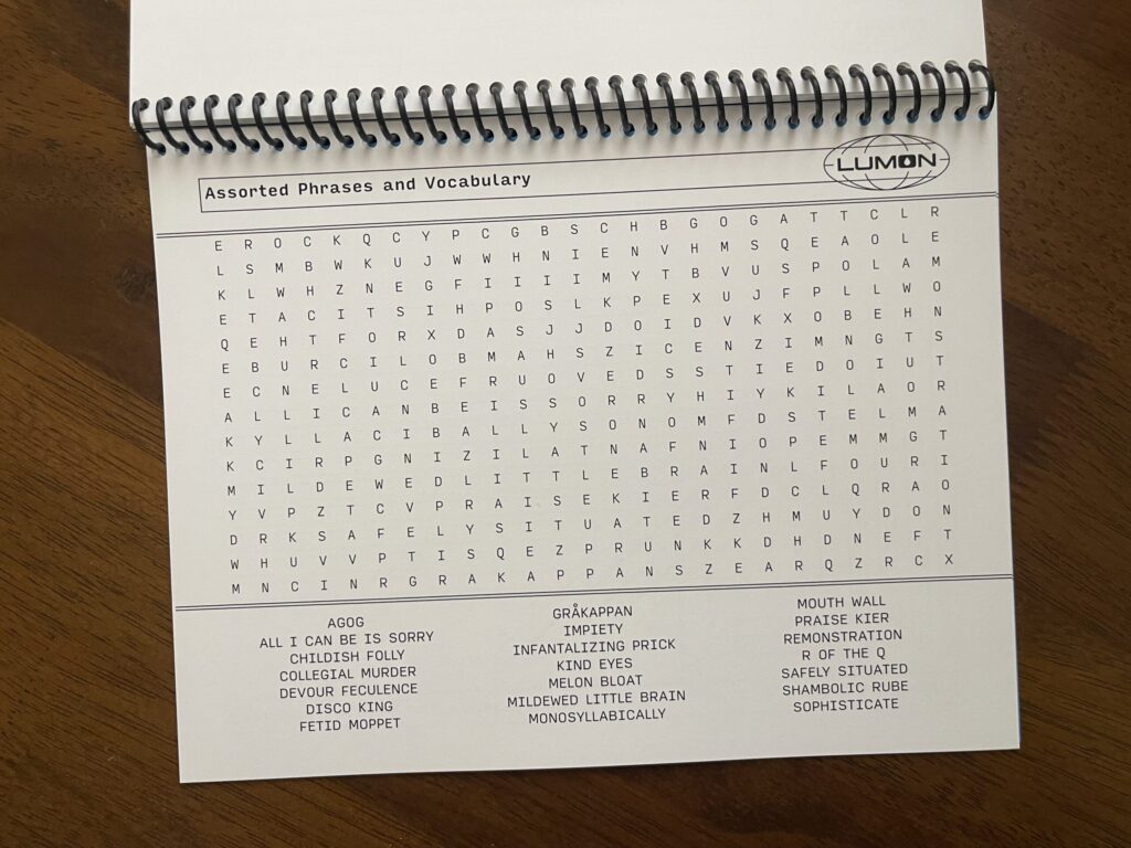 A word search modeled after the MDR terminal screen. The theme of the puzzle is "Assorted Phrases and Vocabulary," and includes fan favorites such as "devour feculence," "gråkappan," "monosyllabically," and "shambolic rube."