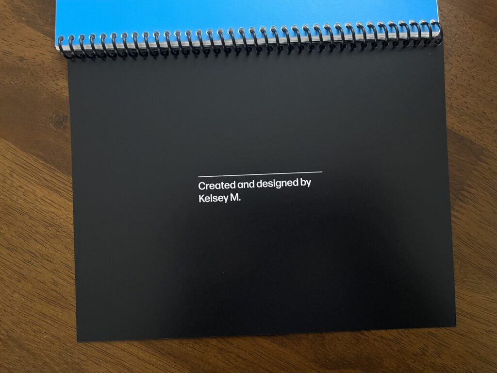 The inside of the back cover of the booklet, designed to look like the show's end credits. The page is black and the text is white. It reads, "Created and designed by Kelsey M."