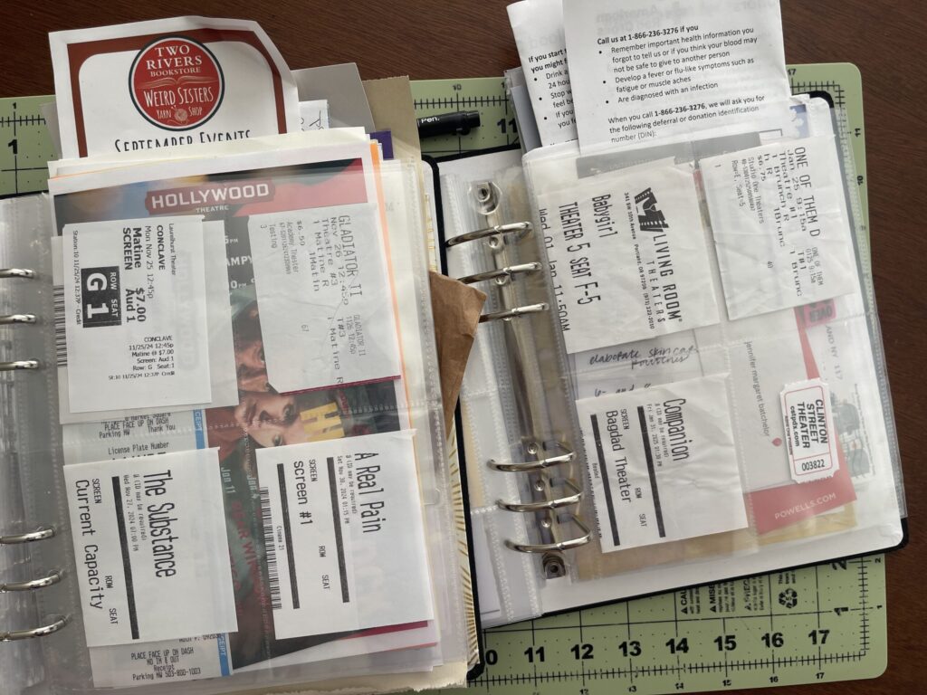 Ticket "stubs" from the movies I saw as part of this project, each in its own 3-inch by 4-inch pocket in a 6-inch by 8-inch page protector.