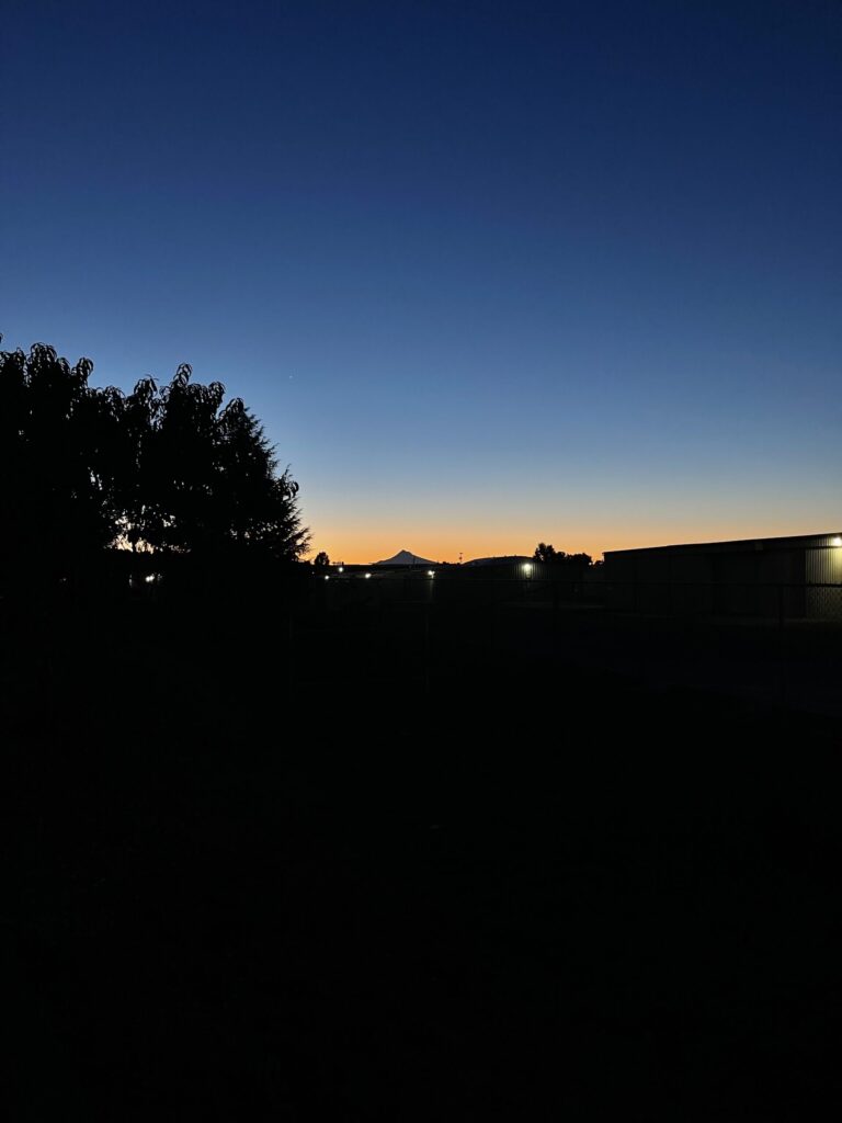 Clear-sky sunrise over Mount Hood.