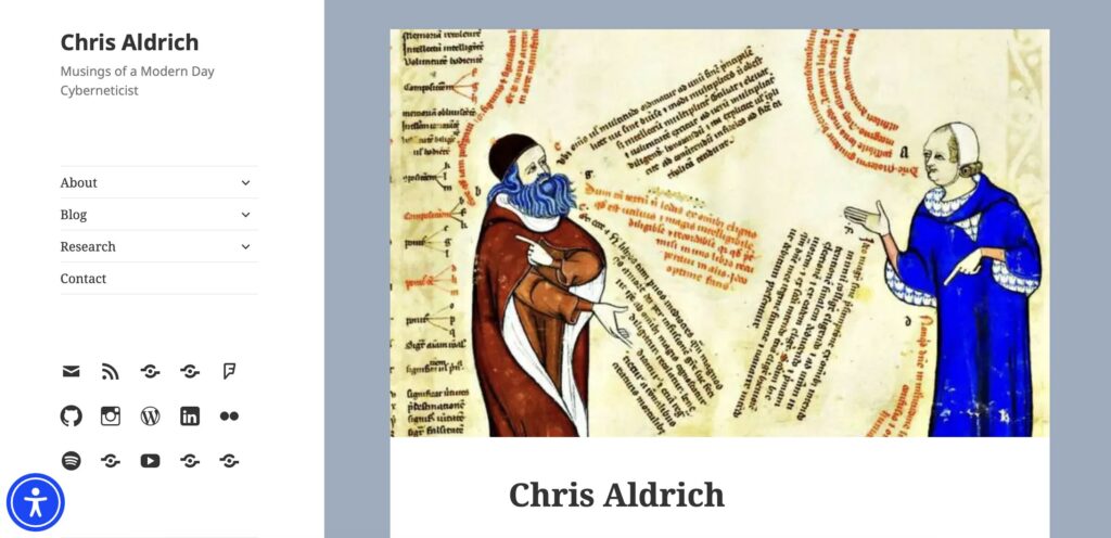 Screenshot of the homepage for Christ Aldrich's personal blog, featuring a page from an illuminated manuscript and his tagline, "Musings of a Modern Day Cyberneticist"