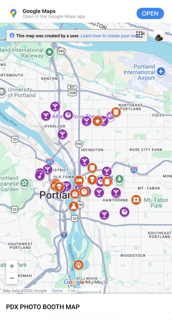 Screenshot of the PDX PHOTO BOOTH MAP as seen when viewing in browser on mobile, with purple icons denoting photo booths inside bars and restaurants, and reddish-orange markers denoting photo booths in establishments that aren't bars or restaurants.