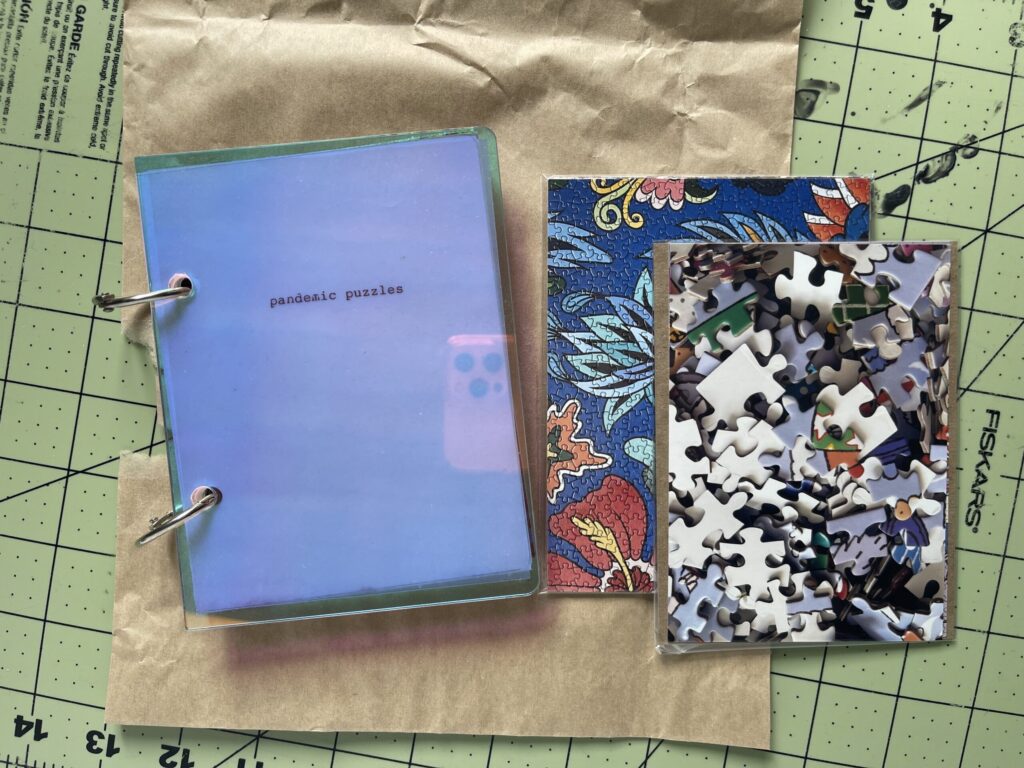 Photos of unpuzzled puzzles pieces and completed puzzles, ready to be inserted into my Pandemic Puzzles mini album. 