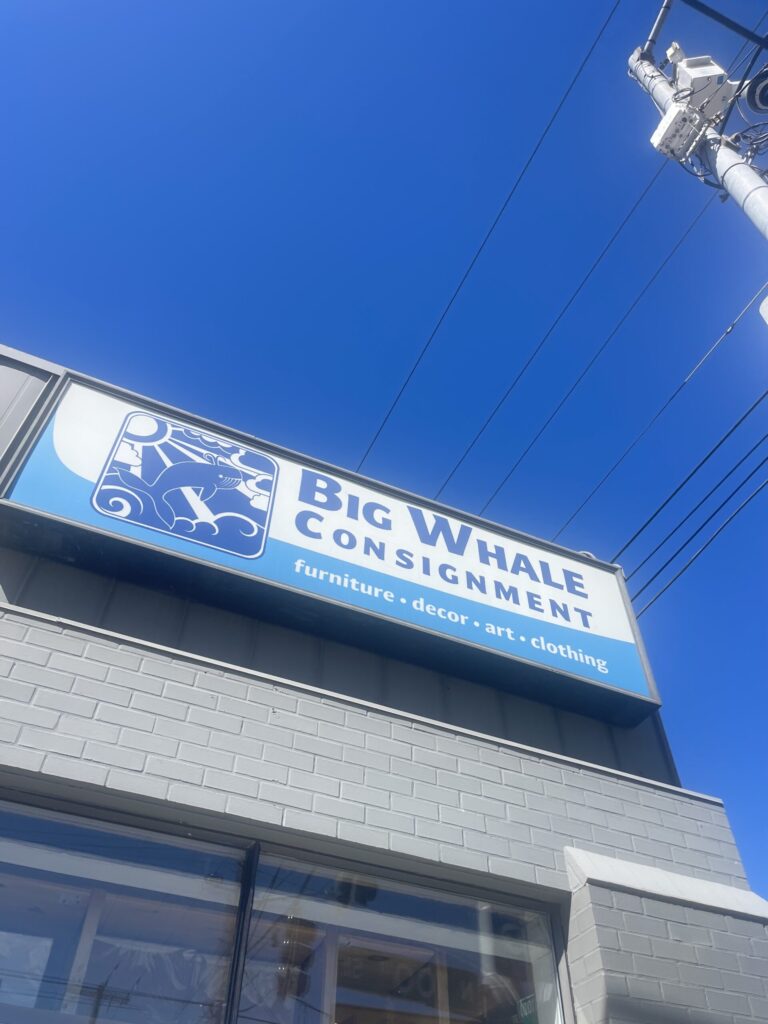 Building signage for the Big Whale Consignment store in Seattle. 